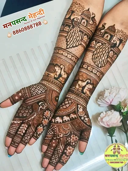 Our expertise lies in creating rich, full-coverage traditional designs. This Marwari-style mehndi features classic motifs like elephants, peacocks, and palace architecture, perfect for making a statement at any celebration.