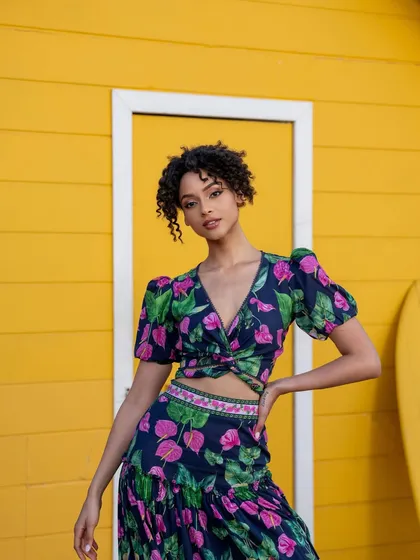 A close-up of a floral crop top from the Tangerine Tiger collection. This type of shot is perfect for highlighting specific product details and styling.