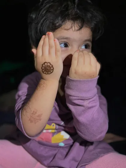 Sometimes, a simple and sweet design is all you need. This tiny mandala on the back of her hand was so quick to apply, and she was absolutely delighted with it. It's the perfect choice for very young or fidgety children.