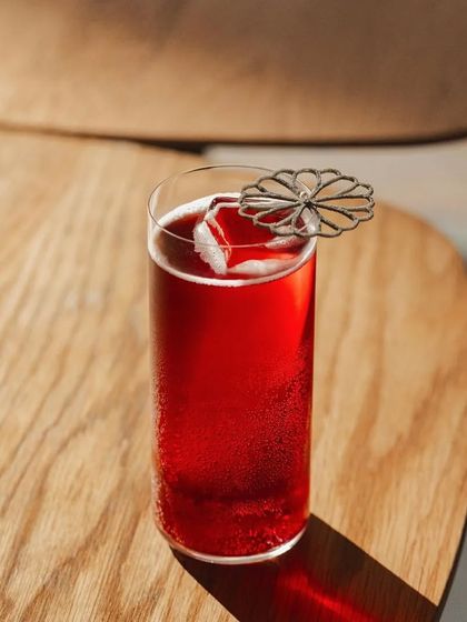 An Indian twist on a rum cocktail. This drink pairs Old Monk with carbonated cranberry juice for a surprisingly delicious combination.
