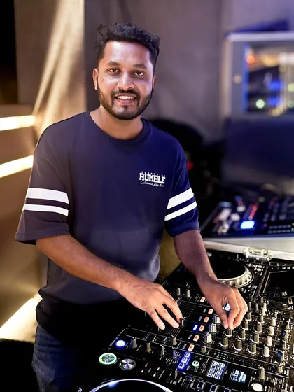 Here I am in my element, getting the tracks ready for the night. A good party is all about reading the room, and I make sure to connect with the crowd to spin the beats that keep Bangalore's nightlife buzzing.