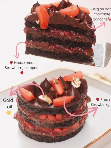 A deconstructed look at our Belgian Dark Chocolate Strawberry Bento Cake. It features layers of rich chocolate cake, house-made strawberry compote, and fresh strawberries, finished with gold foil.