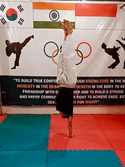 A demonstration of incredible core strength and balance with a handstand. Our fitness conditioning goes beyond just kicks and punches.