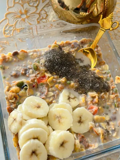 A breakfast bowl that is full of nutrition, health, and happiness. This one combines muesli, soaked chia seeds, and fresh banana slices in milk for a meal that's great for your body and tastes amazing.