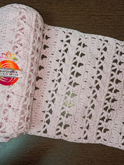 This light pink crocheted scarf features a lovely cross-stitch pattern. It was my fourth contribution to the Guinness World Record entry for breast cancer patients.