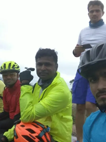 A candid moment with some of our riders taking a well-deserved rest during a trail adventure.