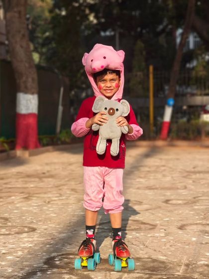 Cuteness overload. This little one came dressed as a pig, complete with a teddy bear, for our fashion show.