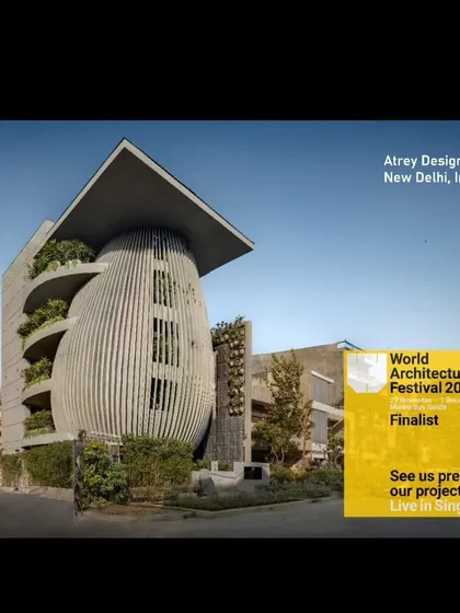 Our studio was presented live at the World Architecture Festival in Singapore. This image captures the building's unique presence in its residential neighborhood, standing as a piece of architectural sculpture.