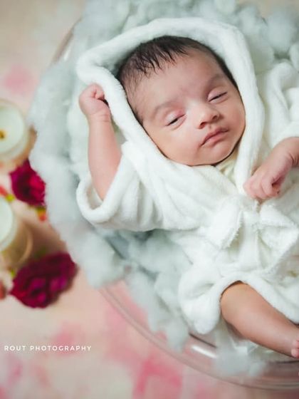 Another view from the 'Spa Day' themed shoot, this time capturing the baby in a deep, peaceful sleep. The soft lighting and cozy setup ensure your baby is comfortable throughout the session.