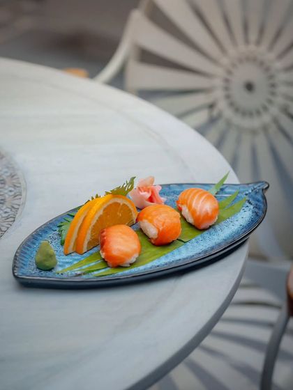 A symphony of simplicity and elegance. Our Salmon Nigiri is a single, flawless bite that celebrates the purity of its ingredients.