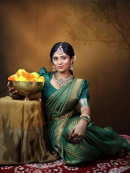 This image captures the royal feel of my Kundan and polki-style jewellery. The combination of a rich green saree with this elegant choker set is ideal for festive occasions like Diwali or for attending a wedding.