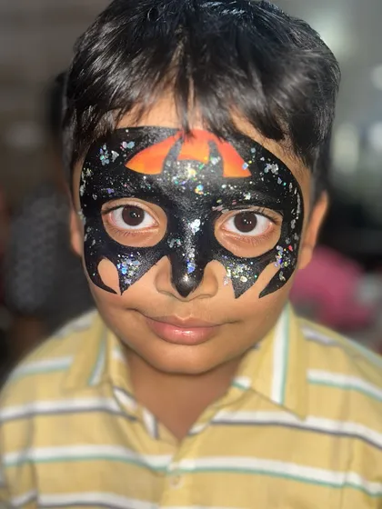Become your favorite superhero! This Batman mask is a classic choice for boys and is always a hit. I'll teach you how to create sharp, symmetrical masks with a touch of glitter for that extra cool factor.