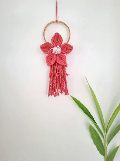 Blooming with macrame magic. This was our first attempt at a macrame flower, and we love how this simple yet beautiful wall hanging turned out.