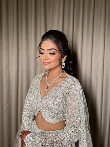 A close-up of Ruchita's sangeet eye makeup, showcasing the beautiful blend of silver and black for a dramatic effect.