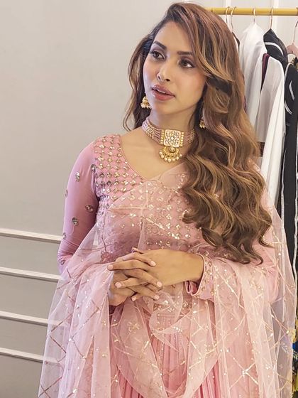 Another angle of the soft waves, showing their beautiful texture and movement. This is a perfect style for a bride who wants to feel effortlessly beautiful.