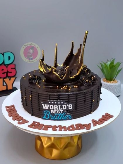 A rich chocolate cake for the "World's Best Brother," topped with a dramatic chocolate splash.
