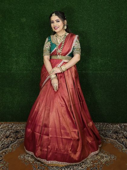 The vibrant colors of this traditional outfit make it a stunning choice for festive occasions like Diwali or Navratri.