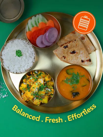 Balanced, fresh, effortless. This veg thali with pumpkin sabzi and dal is a perfect example of our food philosophy.