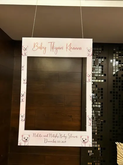 We provide fun, themed props like this custom photo frame to help guests capture memories.