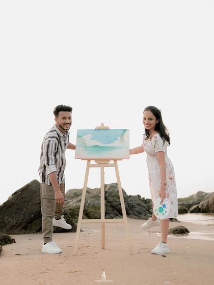 Proudly displaying their finished masterpiece. This is a fun and rewarding shot to get at the end of a themed session.