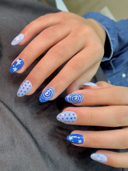 Another look at this fun, hand-painted celestial design. The mix of patterns and shades of blue makes it a really playful and unique set.