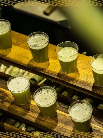 Shots of freshly pressed sugarcane juice, a sweet and nostalgic treat. This live station is a wonderful way to offer guests a taste of authentic, natural refreshment.