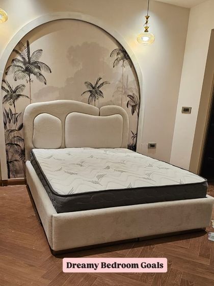 This is one of my most popular "dreamy" bed designs. The unique, cloud-like shape of the upholstered headboard creates a soft, sculptural centerpiece for the room.