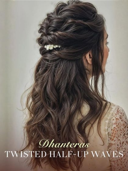 For Dhanteras, I suggest these twisted half up waves. This romantic style is adorned with a delicate pearl clip, adding a touch of elegance that is perfect for the start of the festivities.