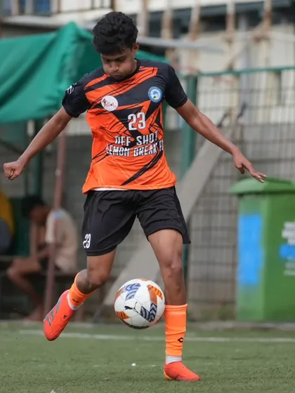 A player shows precise ball control, a key aspect of our possession-based football philosophy.