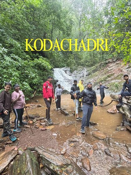 A group of our trekkers crossing a stream on the way to Kodachadri peak.