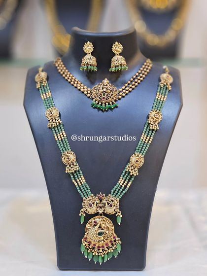 This temple jewellery set with green beads is perfect for South Indian bridal looks or for anyone who loves a pop of color.