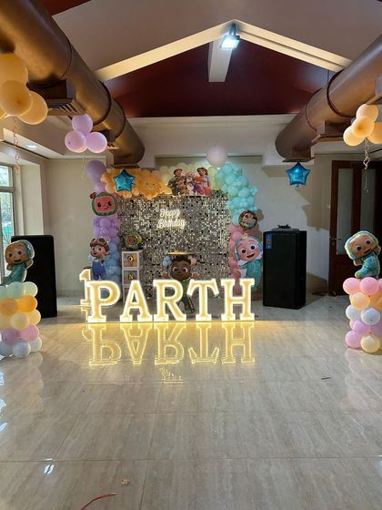 A wide view of Parth's Cocomelon celebration, showing how the decor fills the room and creates a festive atmosphere.