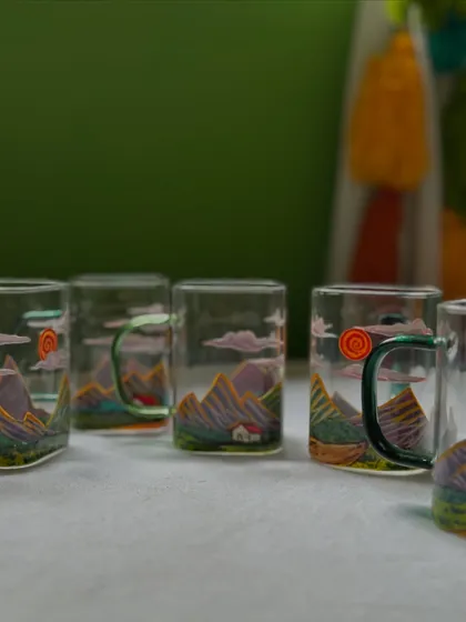 Another angle of the 'Pahari' chai mugs, showcasing the different colored handles that add a pop of fun to the design.