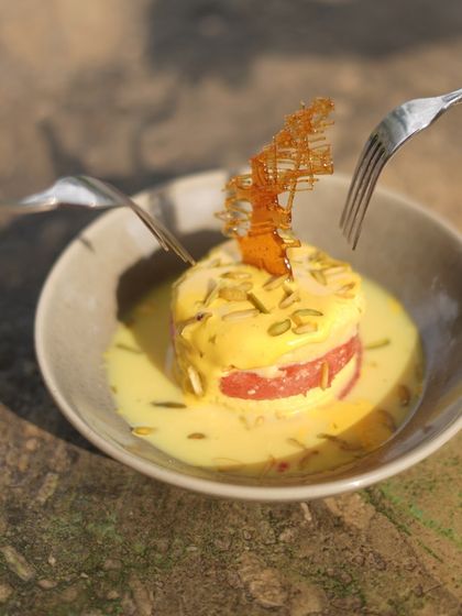 Our Watermelon Rasmalai is a dessert that demands to be shared. Two forks diving into this unique creation is a picture of pure indulgence.