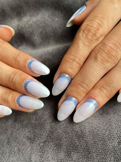 This combination of chrome white and glitter blue is perfect for a wintery or ethereal vibe.