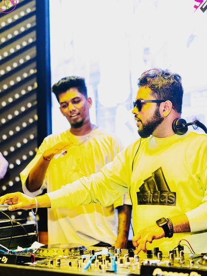 Showtime scenes with my friend DJ Jezzter. We're in the zone, getting ready to drop the next banger.