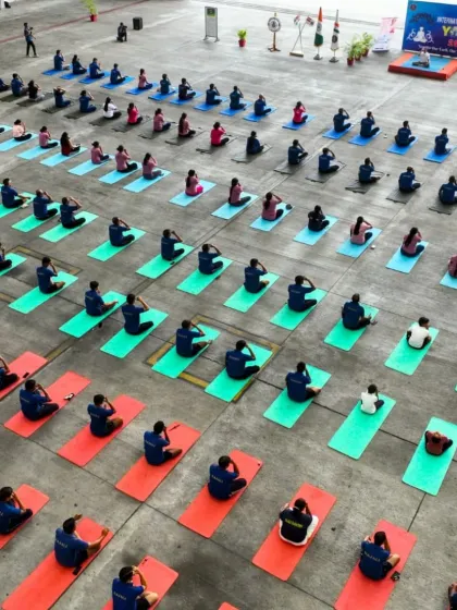 An aerial view of a massive yoga session for naval officers. The scale of these events highlights the widespread adoption of yoga within our country's defense forces for holistic fitness.