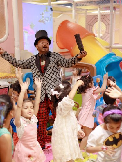 A magician gets the whole crowd involved in his act. Our entertainers are skilled at managing groups of children and keeping them engaged.