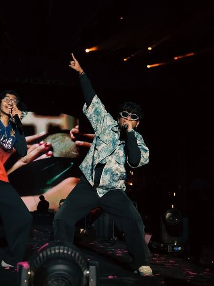 Two artists sharing the stage, creating a dynamic and high-energy performance. I facilitate artist collaborations and ensure the stage is set for memorable, one-of-a-kind moments.