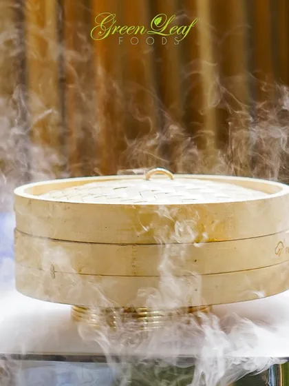 We use dramatic presentation techniques to create a memorable experience. The dry ice effect around this bamboo steamer adds a touch of theater and excitement to the buffet line.