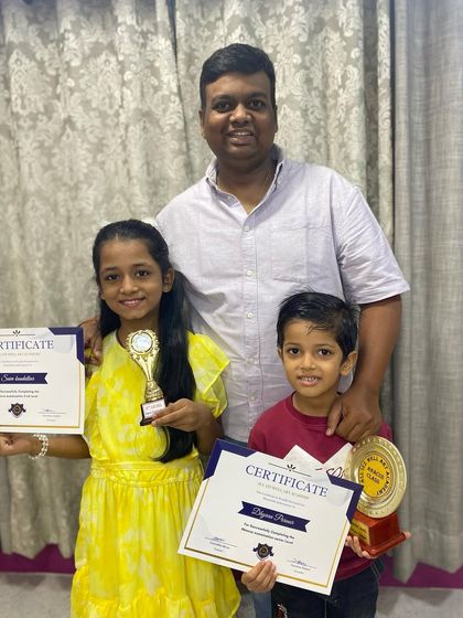 Siblings Saee and Dhyan celebrating their abacus achievements together. It's wonderful to see families learning and growing with us.
