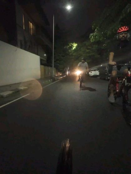 A POV shot of our night ride through Indiranagar. It's a unique and peaceful way to see the city.
