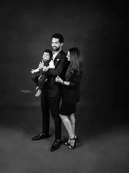 Family portraits are a beautiful way to look back on happy moments. This classic, formal family portrait in black and white is simply timeless.