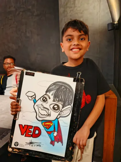 This young man is now a superhero. I love creating themed caricatures for kids' parties, turning them into their favorite characters.