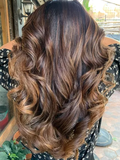 The back view of this glossy brunette hair. The non-bleach color makes the hair look incredibly healthy and shiny.