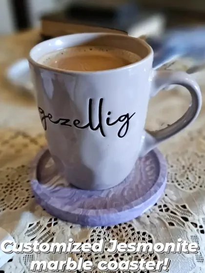 A customer's photo of their custom lavender marble coaster, being used for their morning coffee.