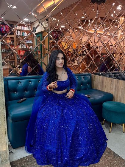 This client chose a stunning royal blue lehenga for her event. We created a dramatic silver smokey eye and a neutral lip to balance the bold color of her outfit.