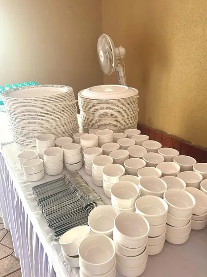 A clean and organized cutlery and plate station is essential for any buffet. I ensure everything is neatly arranged for smooth service.
