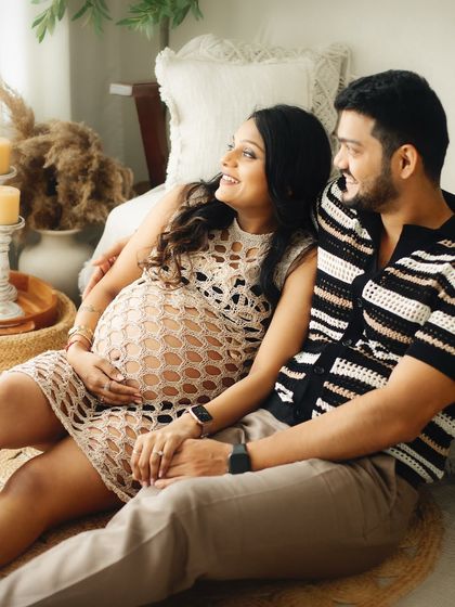 A candid and happy moment captured between poses. The best photos often happen in these in-between moments of genuine laughter and connection.