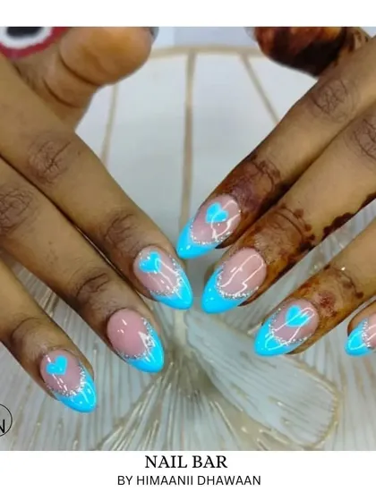 A bright and fun design with neon blue tips and a cute heart detail, perfect for summer.